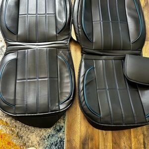 QX 60 seat covers black with a light blue trim.